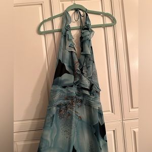 Beautiful blue with gold floral pattern. Perfect for a summer night!